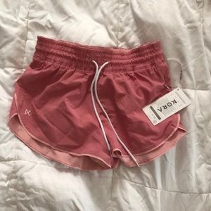 Pink Kora workout shorts